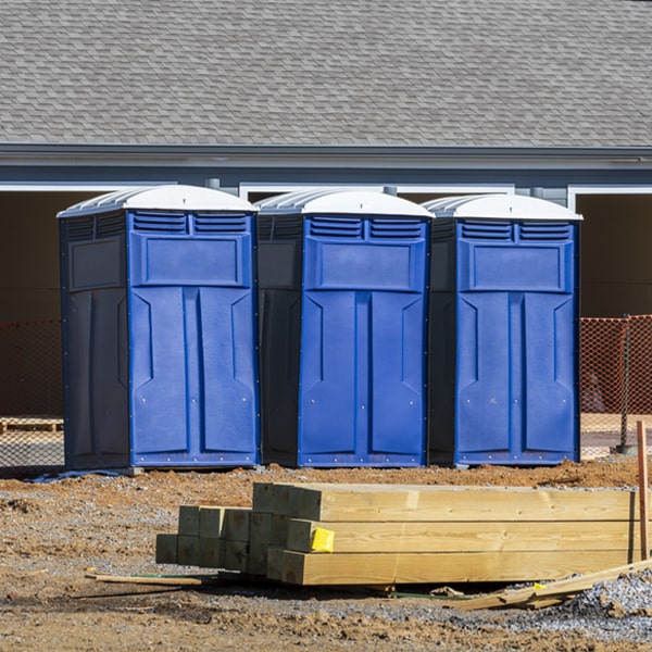 how often are the porta potties cleaned and serviced during a rental period in Longton